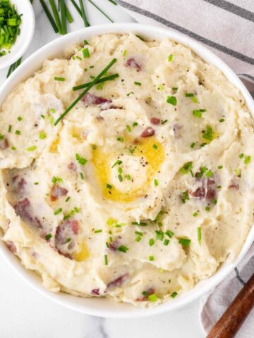 garnished red skin mashed potatoes with butter and chives