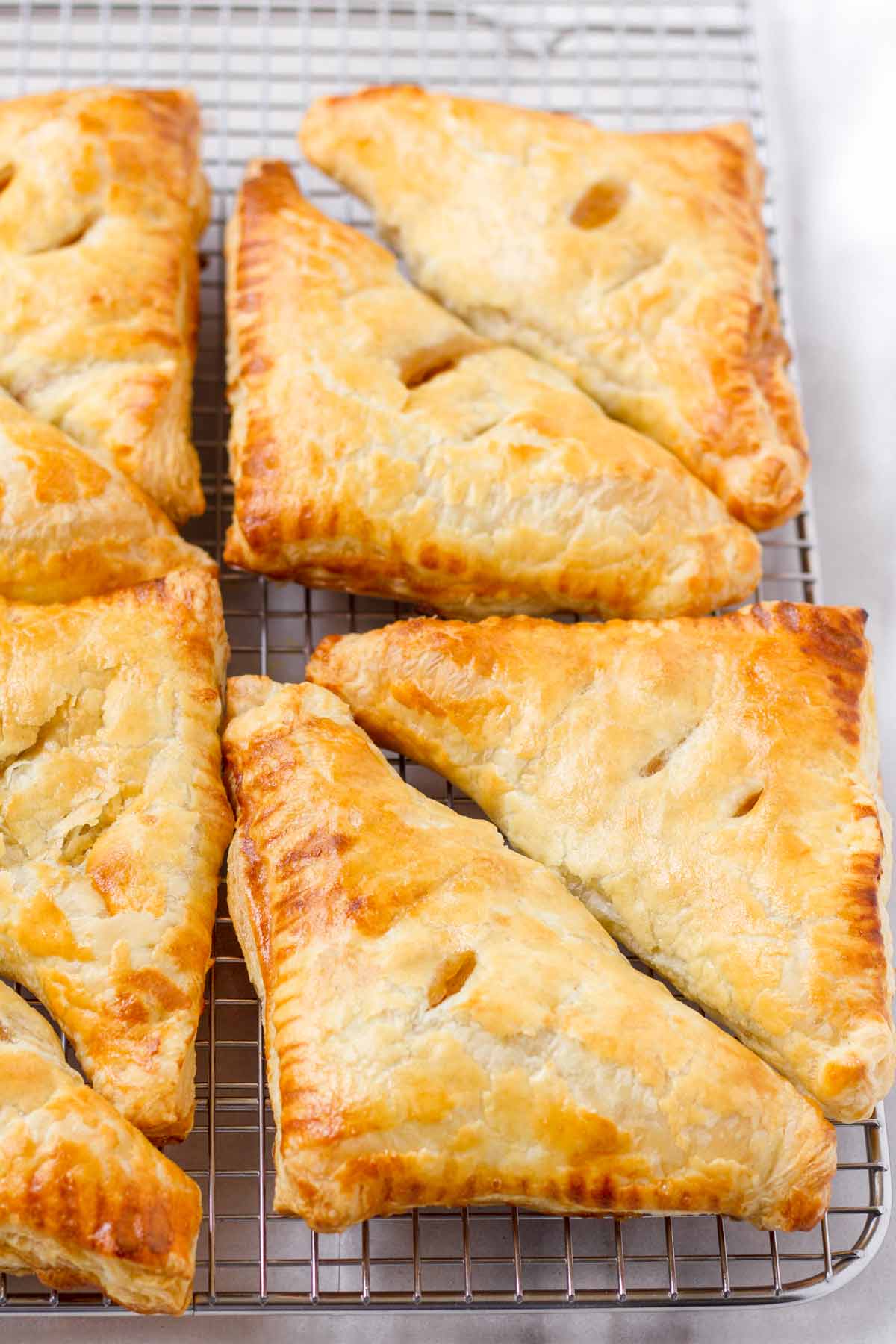 baked golden brown apple turnovers with puff pastry