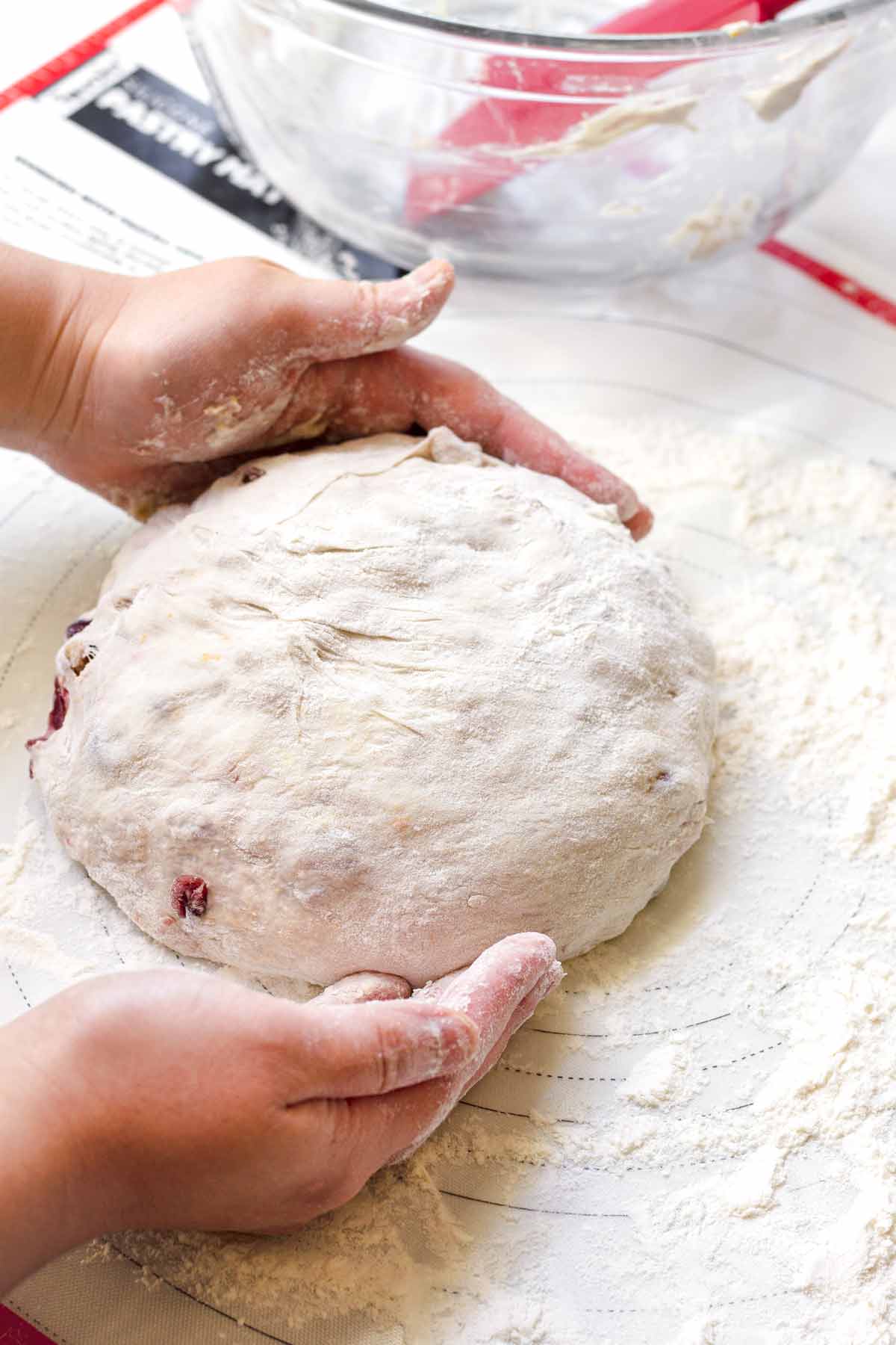 shaping dough with hands