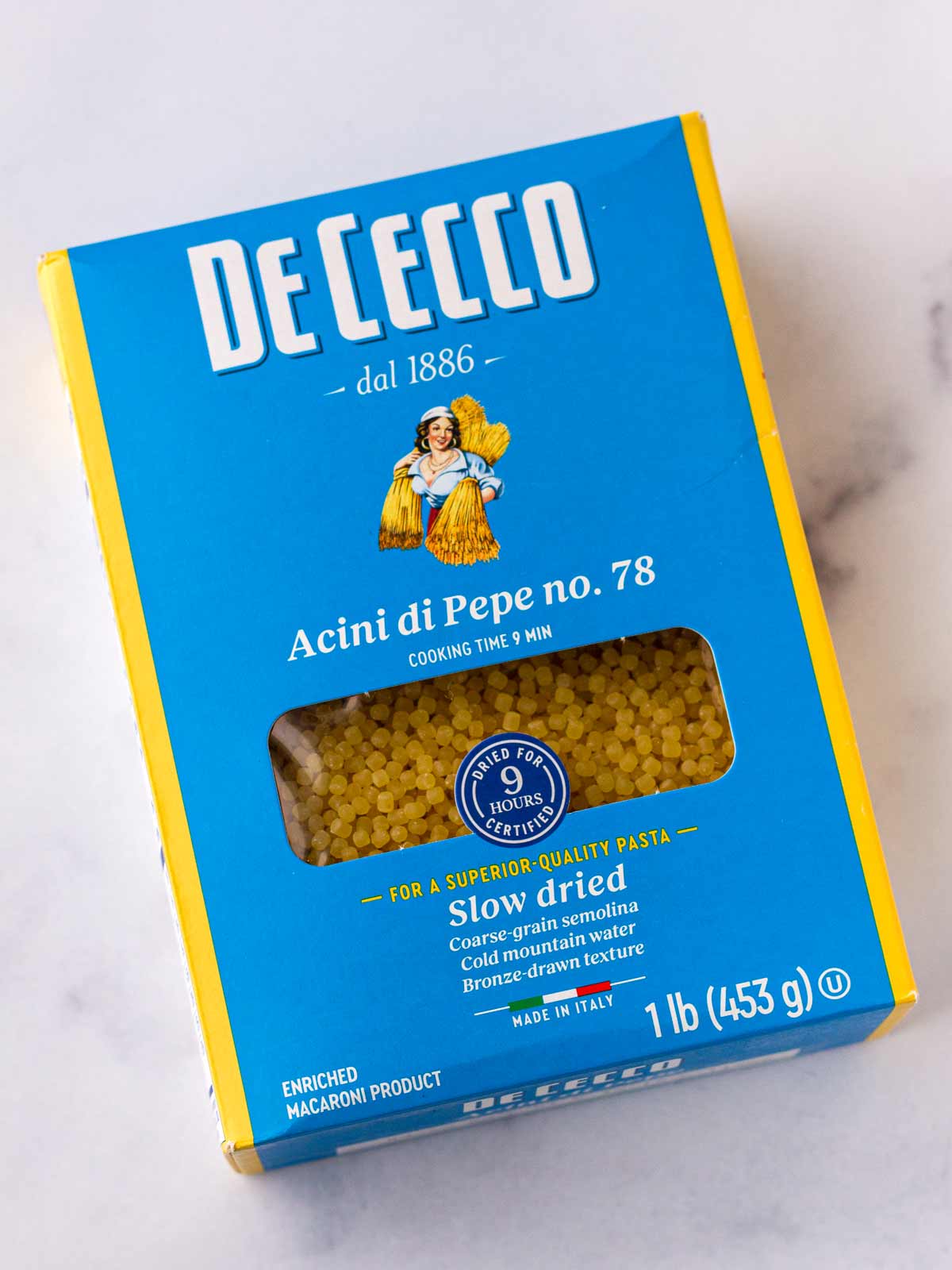 a box of dried acini di pepe pasta