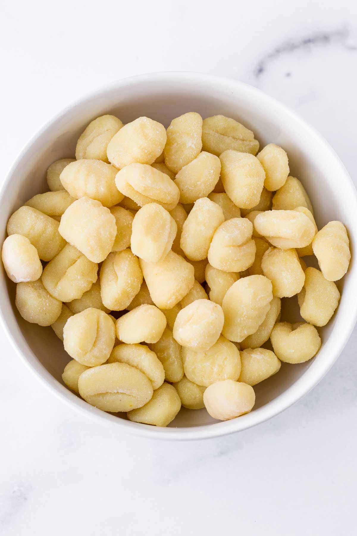 uncooked potato gnocchi in a bowl