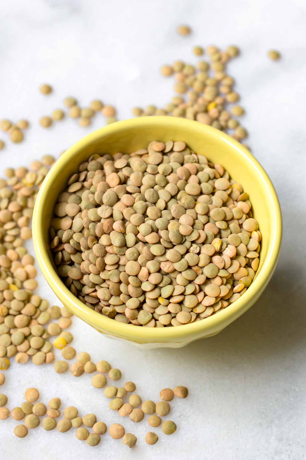 dried green lentils in a small bowl
