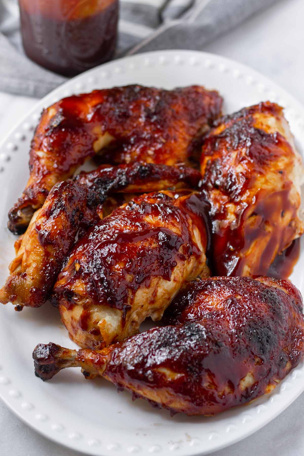 bbq sauce brushed on roasted chicken