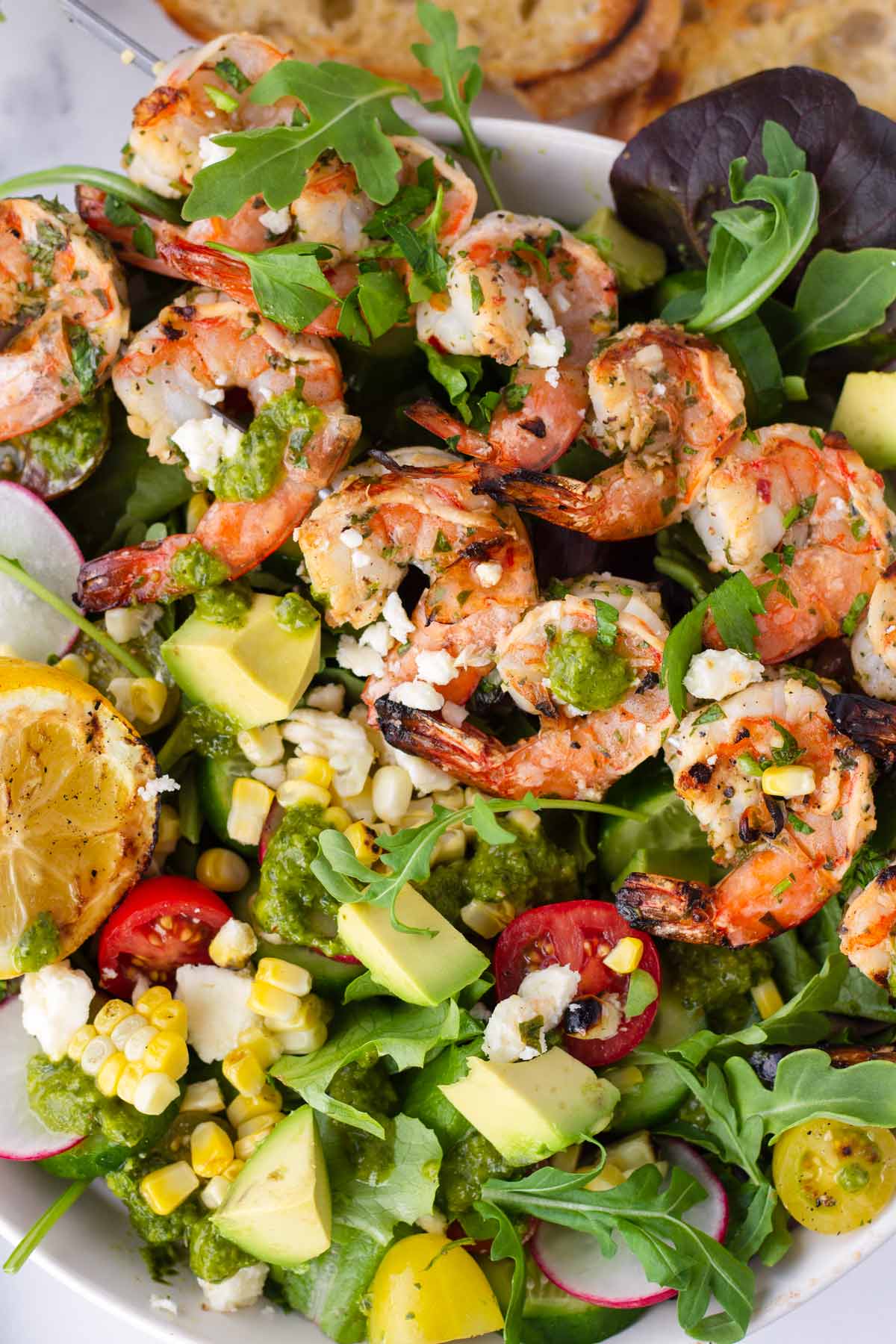 shrimp salad bowl with fresh summer ingredients