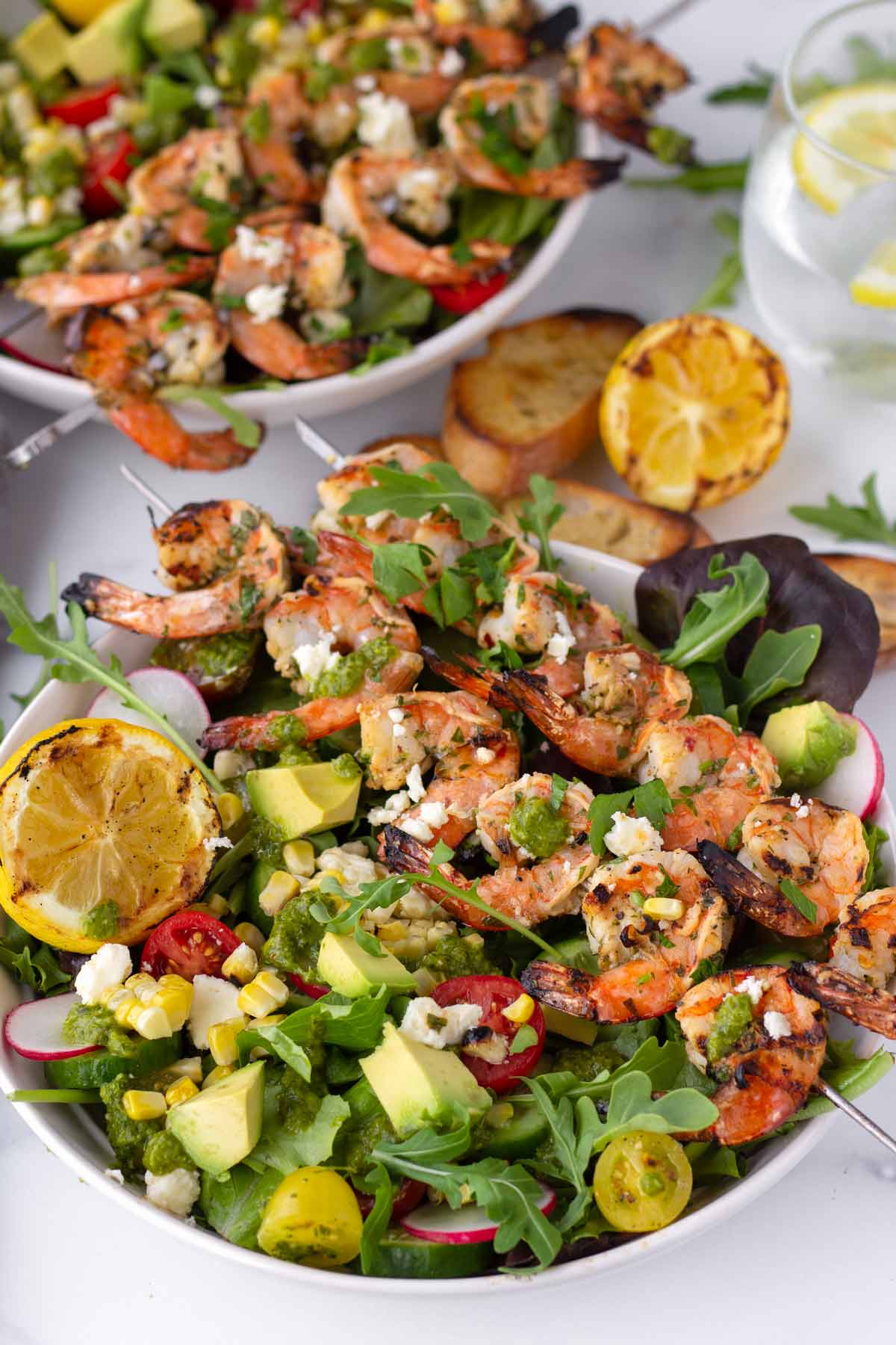 green salad mix with grilled skewers shrimp