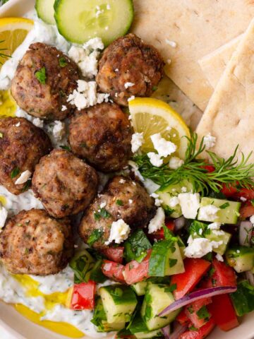 greek meatballs with tomato salad and dip