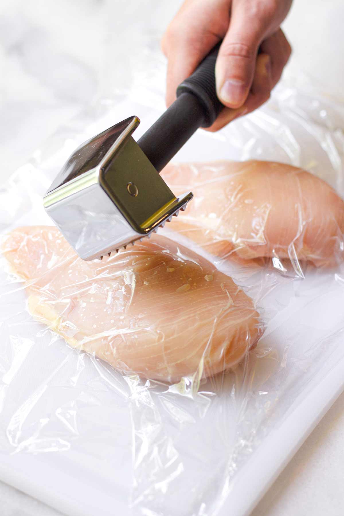 pounding chicken breasts