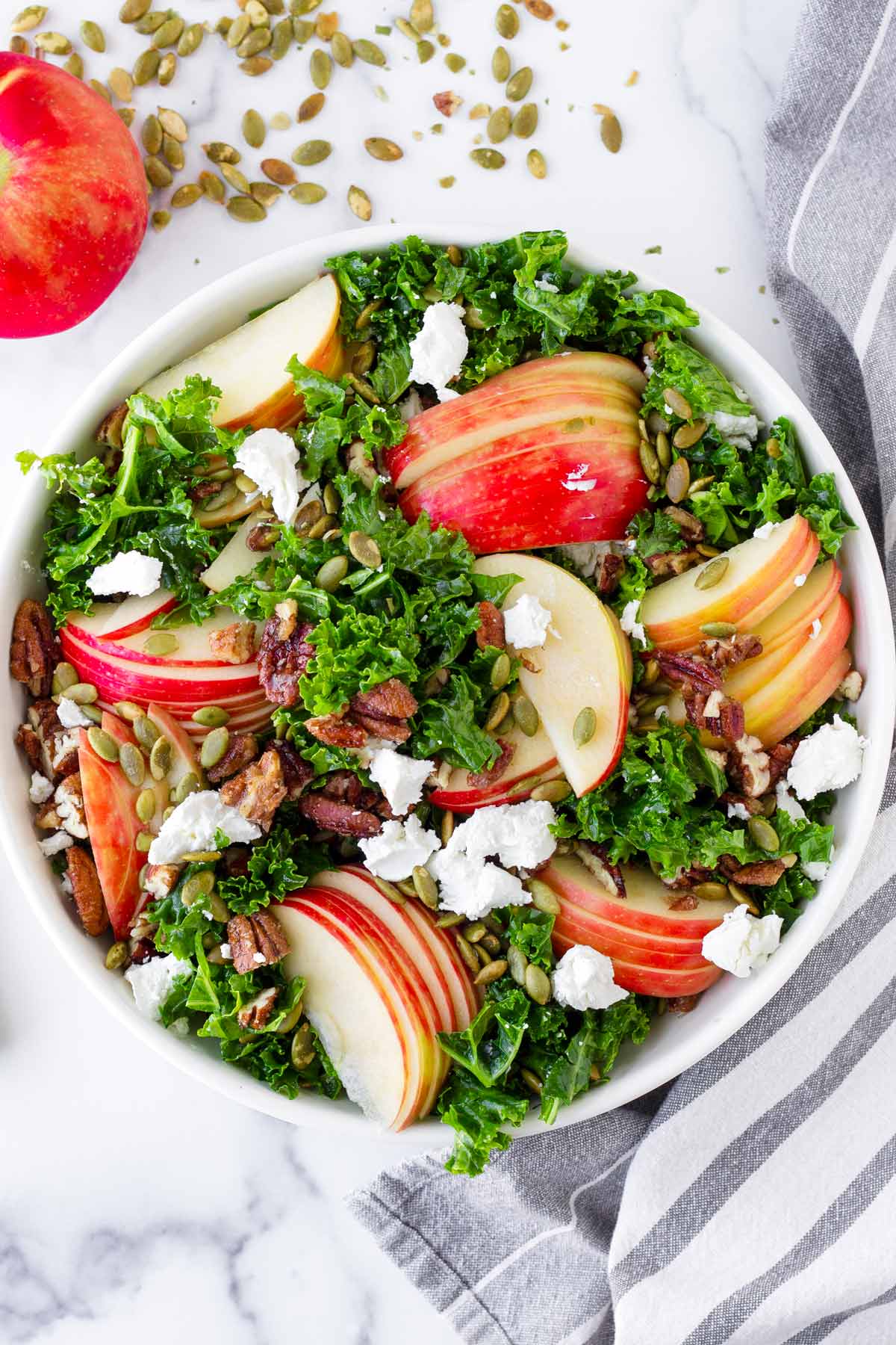 top view of a bowl of apple kale salad