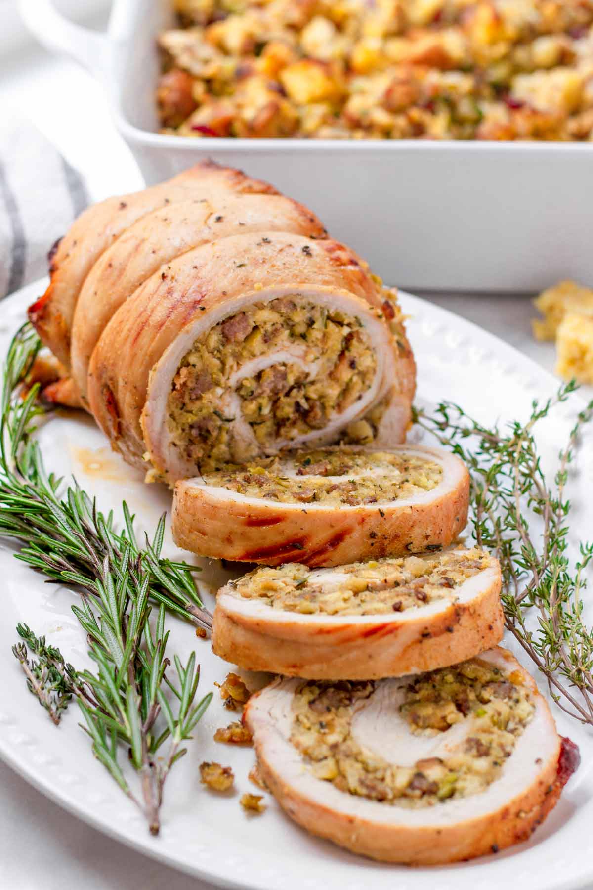 turkey roulade on garnished oval plate