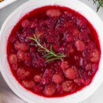 bowl of cranberry sauce with grapes