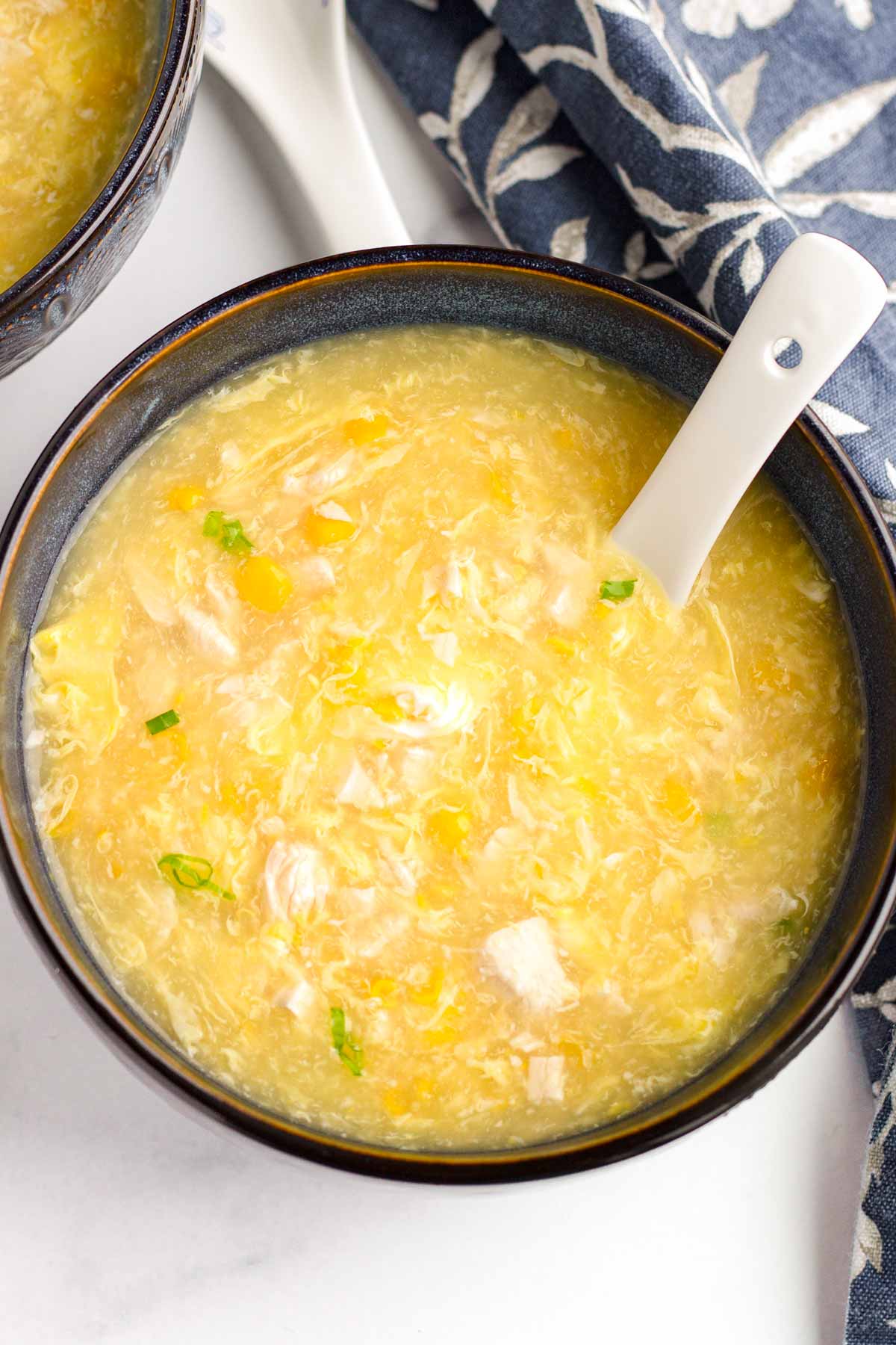 a bowl of chicken corn egg drop soup