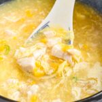 a spoonful of corn chicken soup