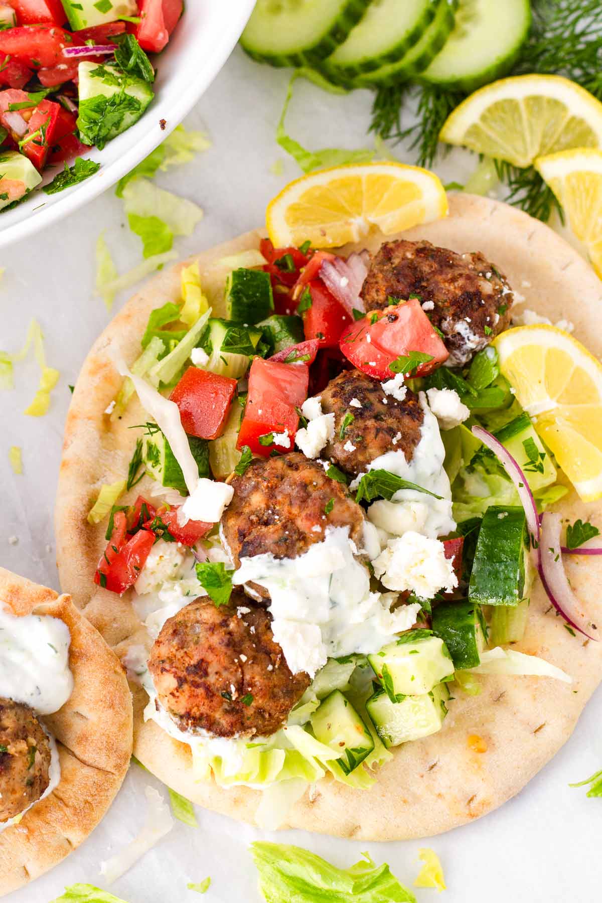 open face pita wraps with meatballs and toppings