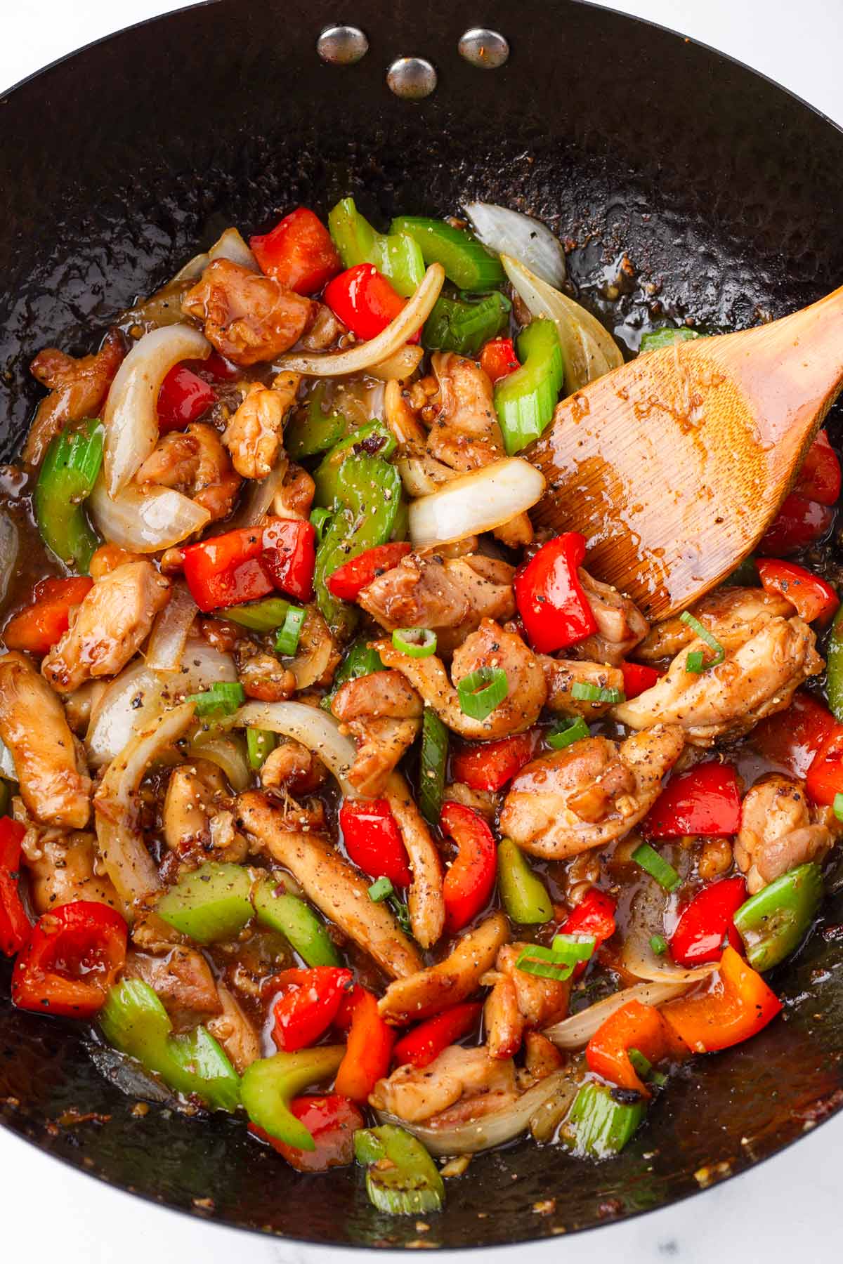 black pepper chicken stir fry in wok