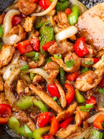 black pepper chicken stir fry in wok