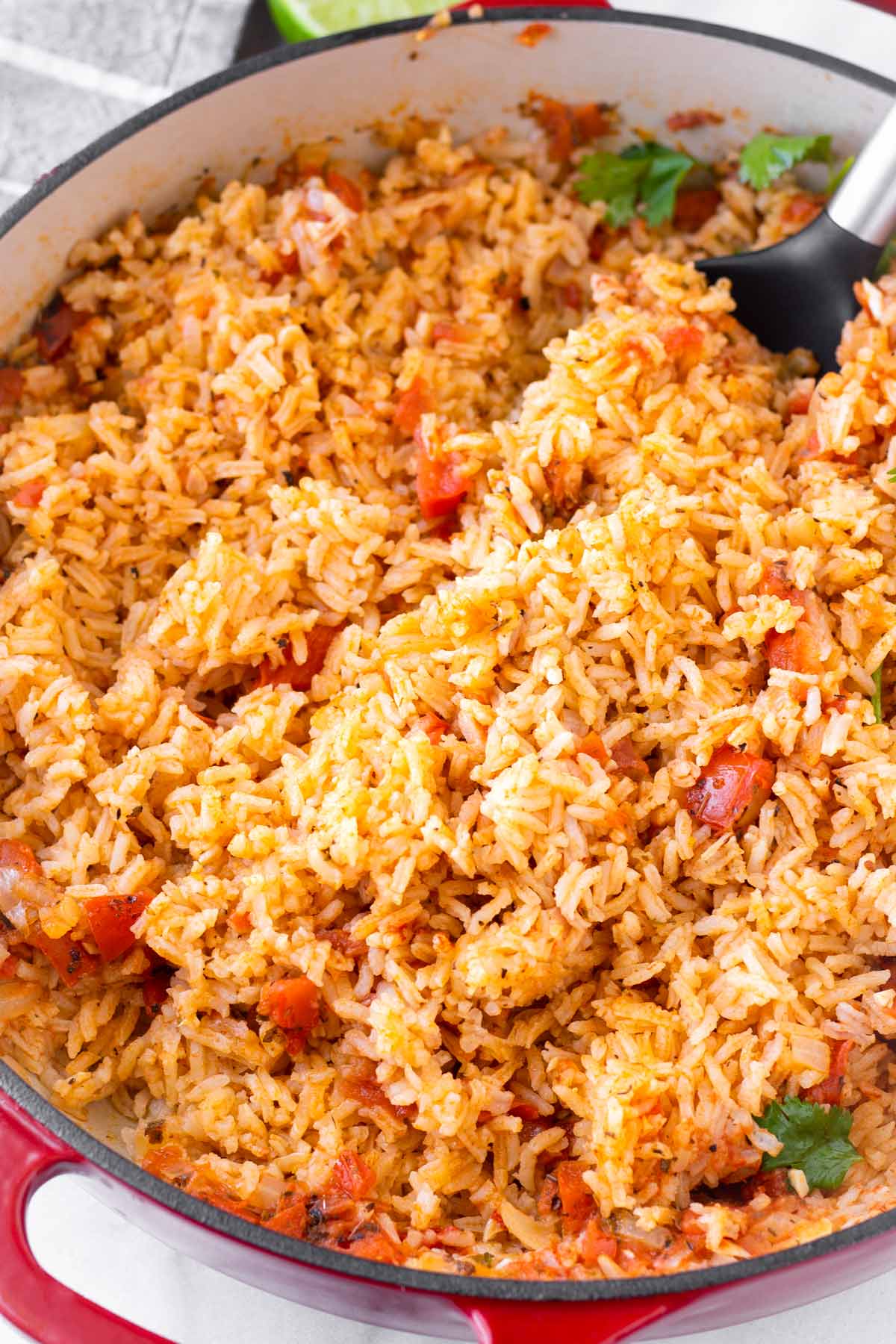 tender mexican tomato rice in dutch oven