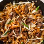 beef chow fun in wok