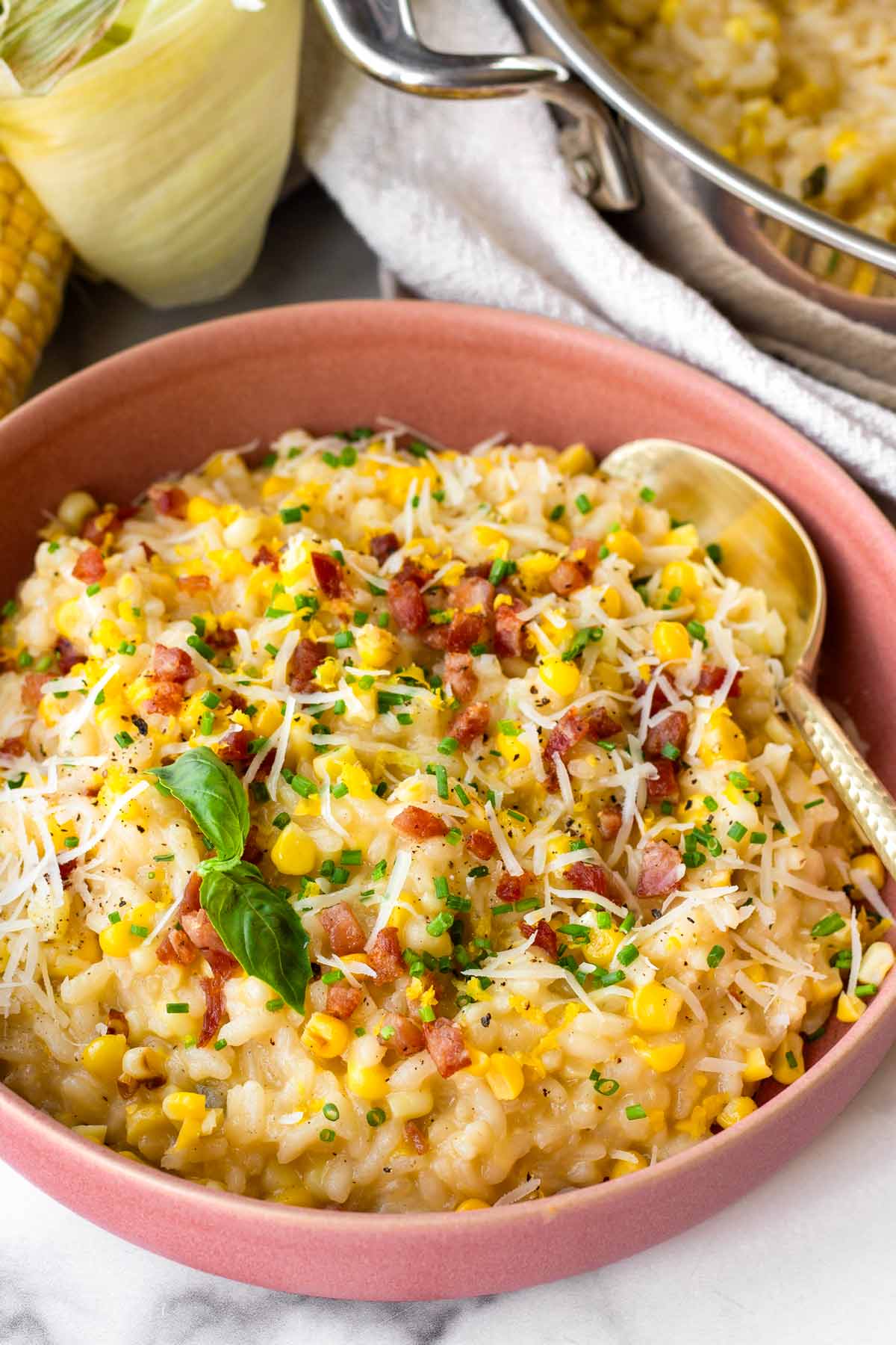 bowl of risotto with corn and herbs