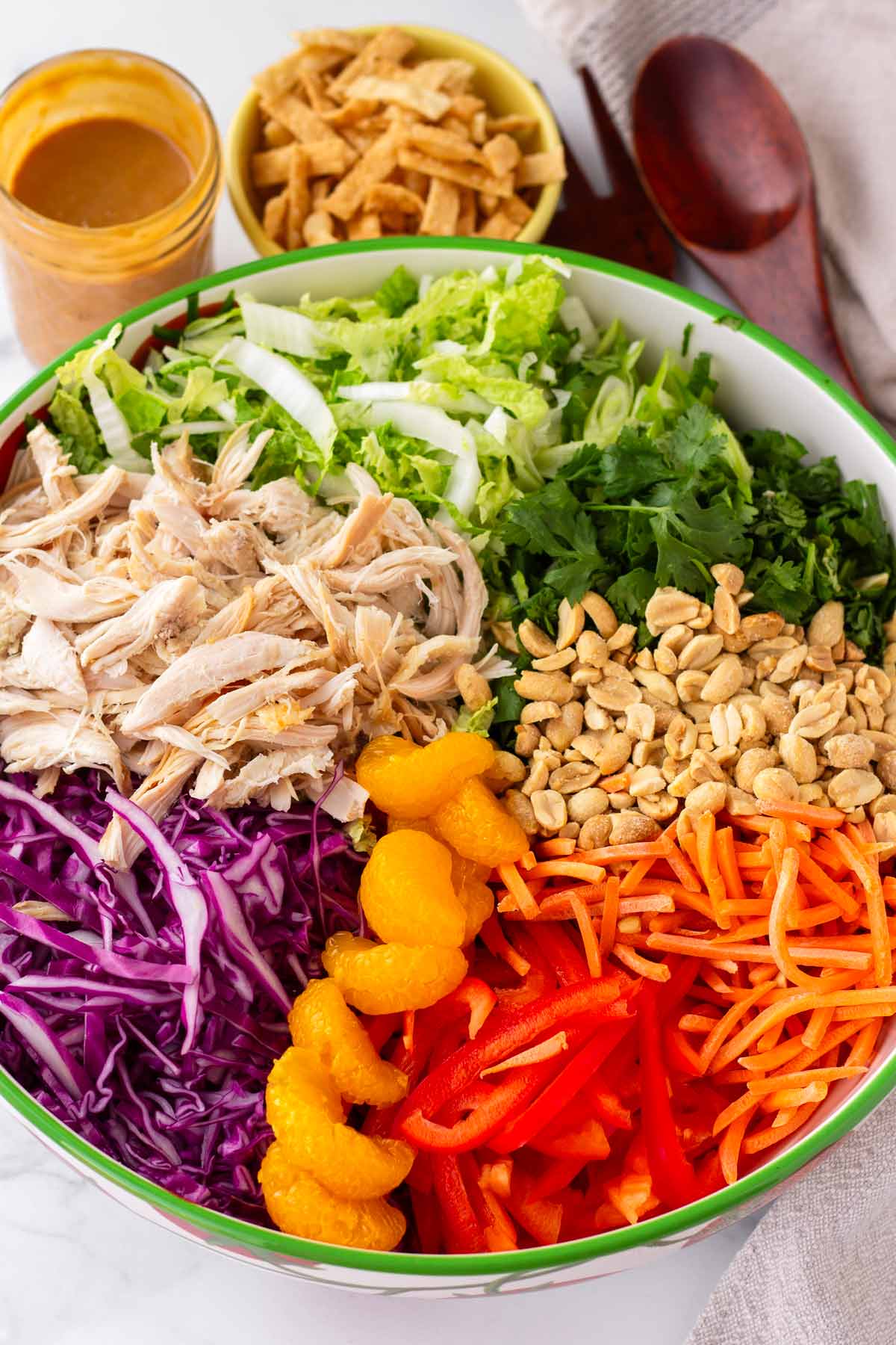 all ingredients for asian chicken salad in bowl