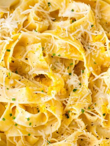 close up of lemon cream pasta with chives