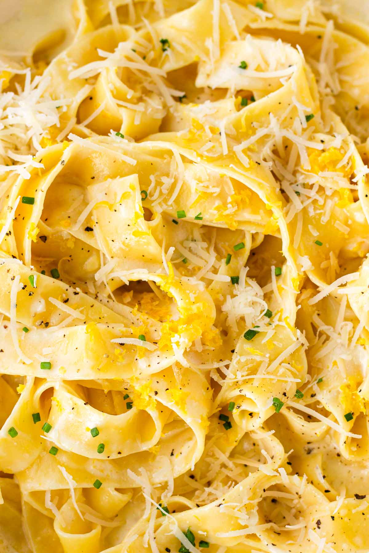 close up of lemon cream pasta with chives