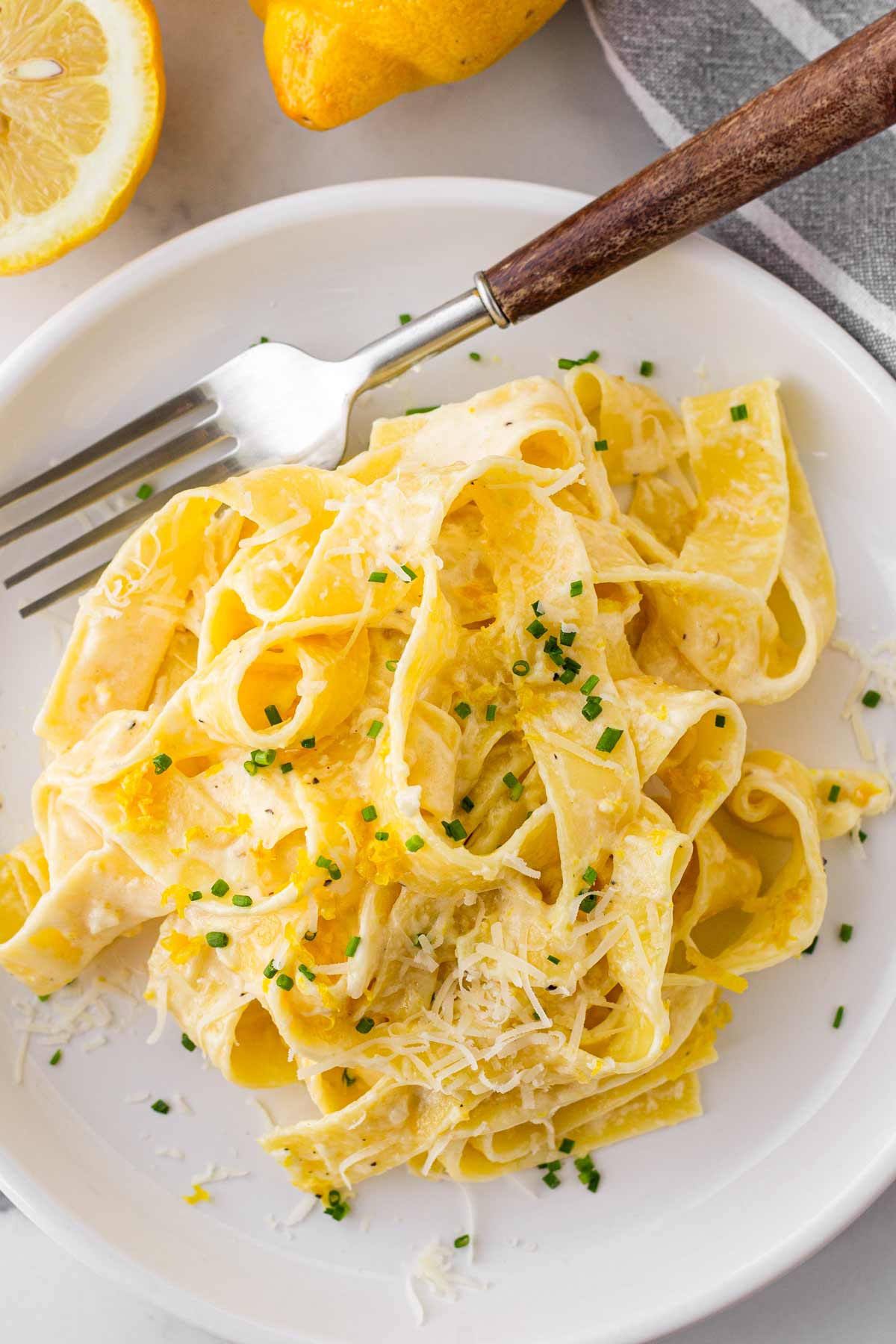 pasta bowl with creamy lemon pappadelle and cheese