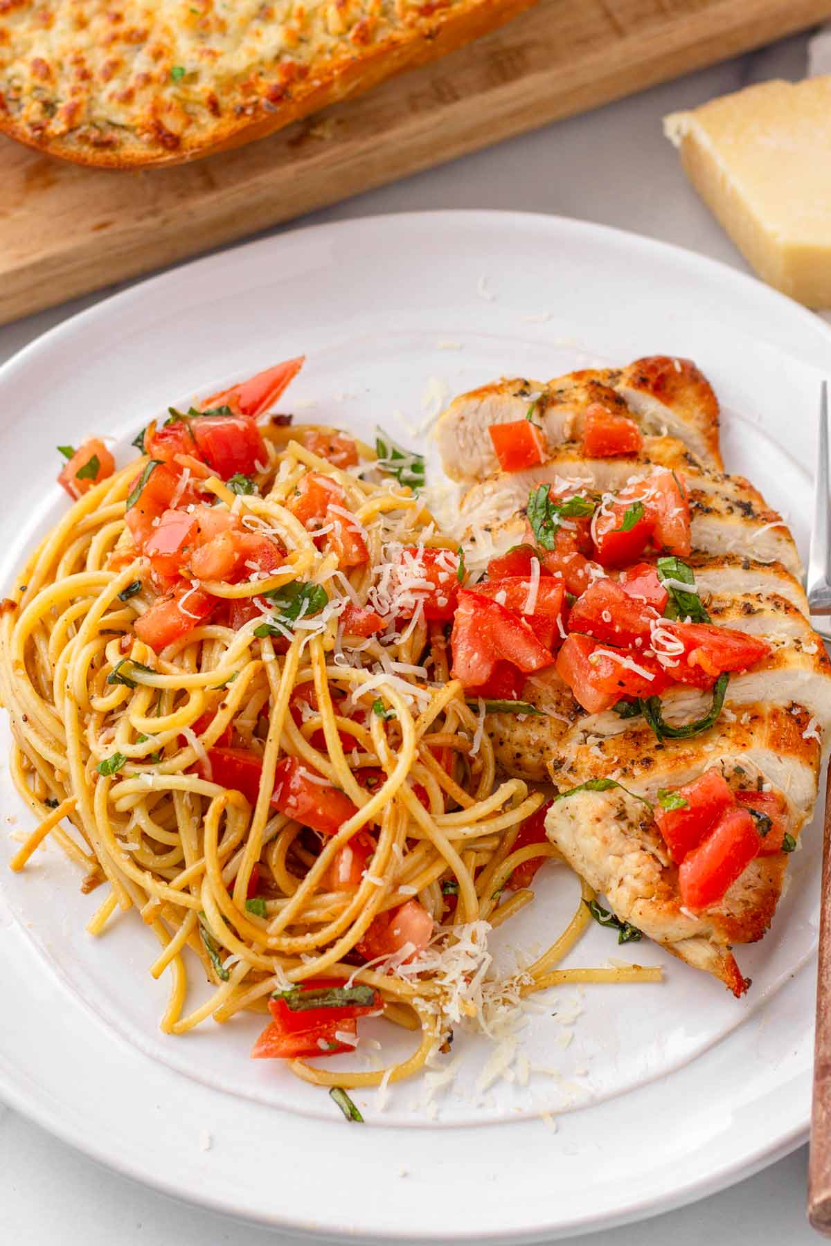 plate with a serving of chicken bruschetta pasta