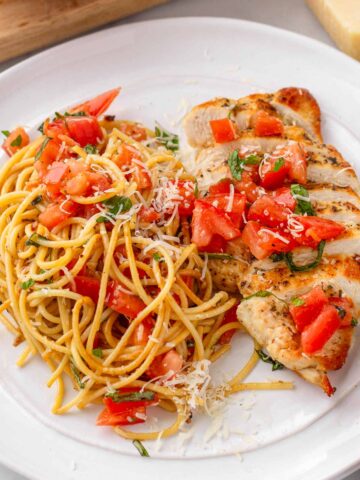 chicken pasta with tomato bruchetta topping