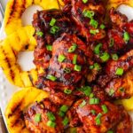 grilled huli huli chicken over grilled pineapples