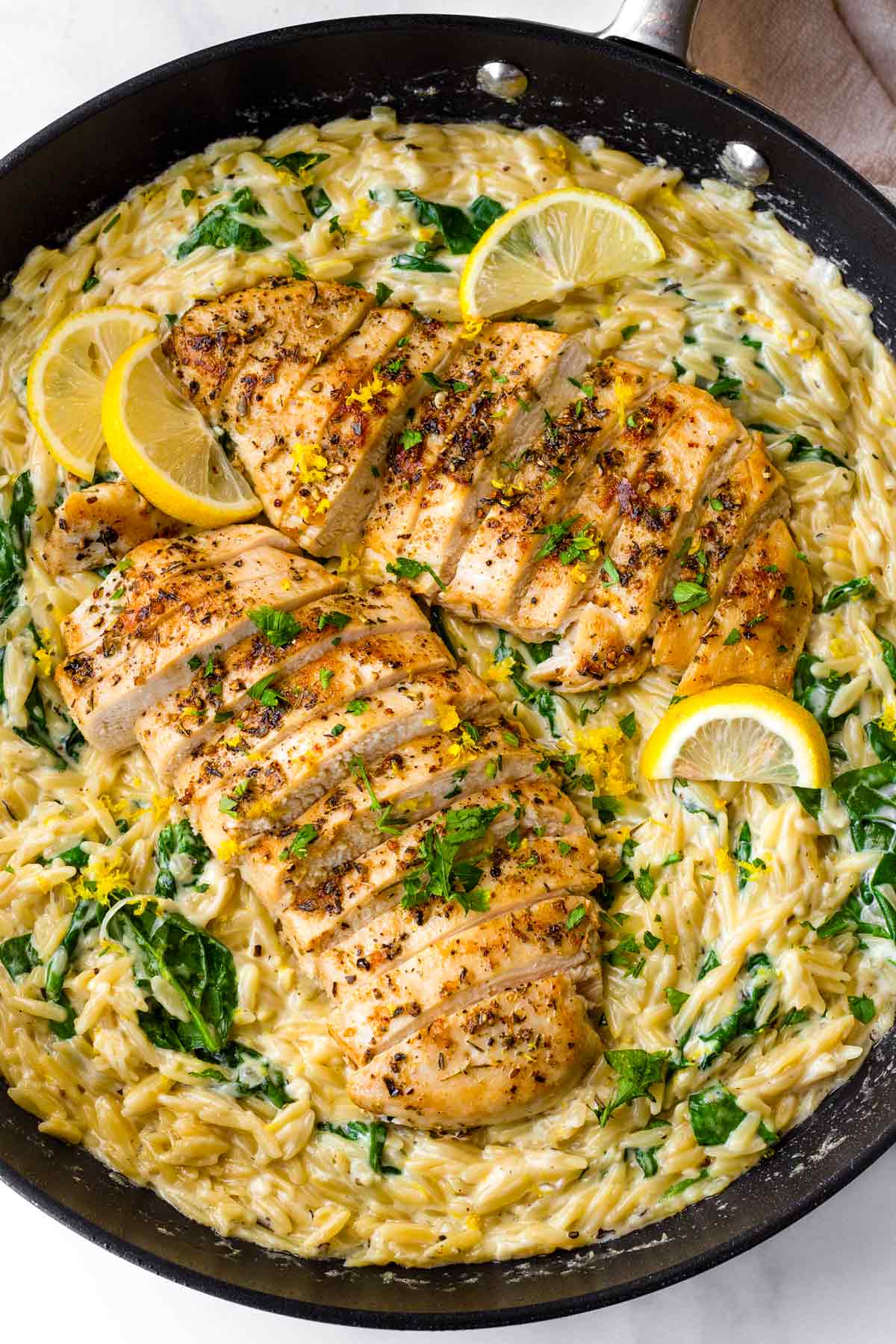 one pan lemon chicken orzo with spinach and creamy sauce