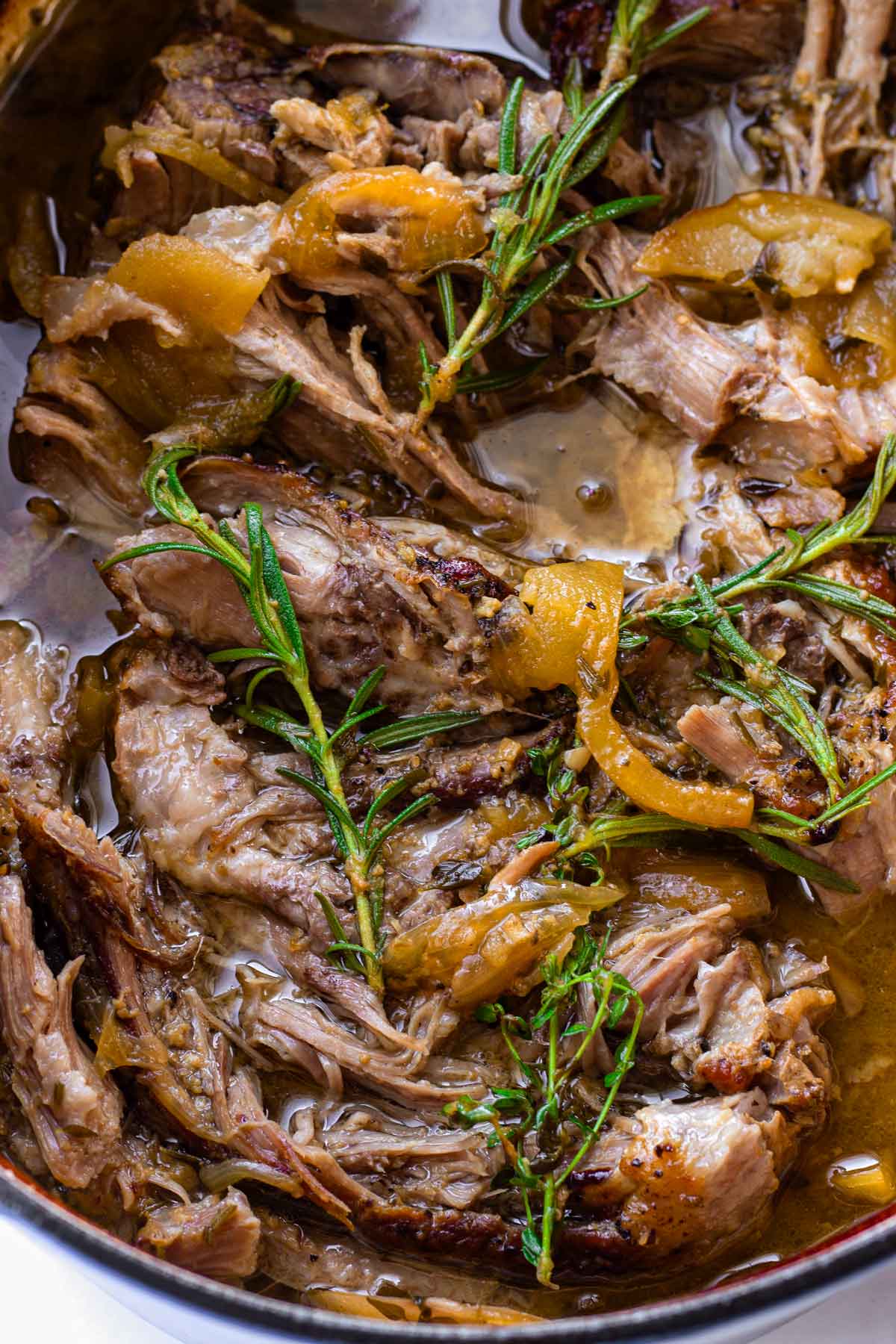 shredded apple cider pork in dutch oven