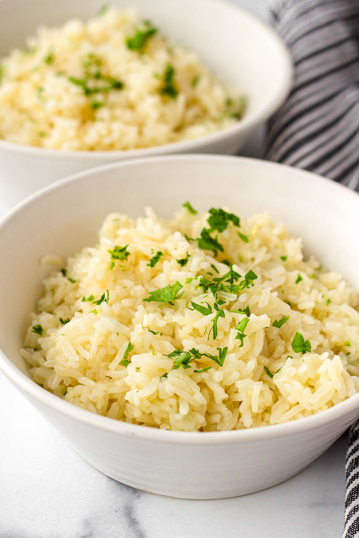 bowl of garnished garlic butter rice