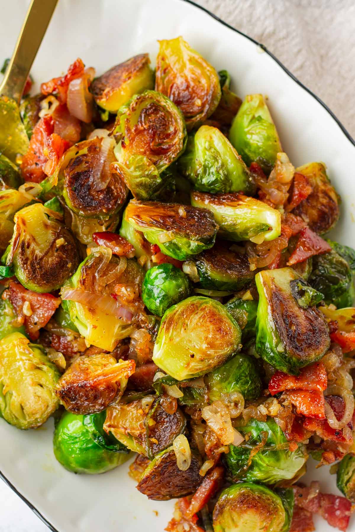 oval platter of brussels sprouts with bacon