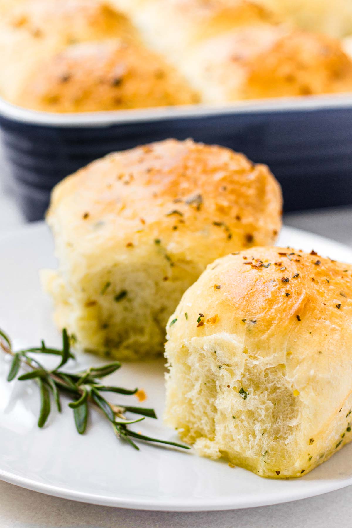 two fluffy garlic dinner rolls