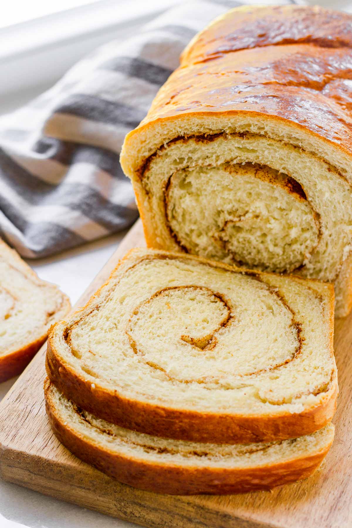 sliced cinnamon swirl bread on a board