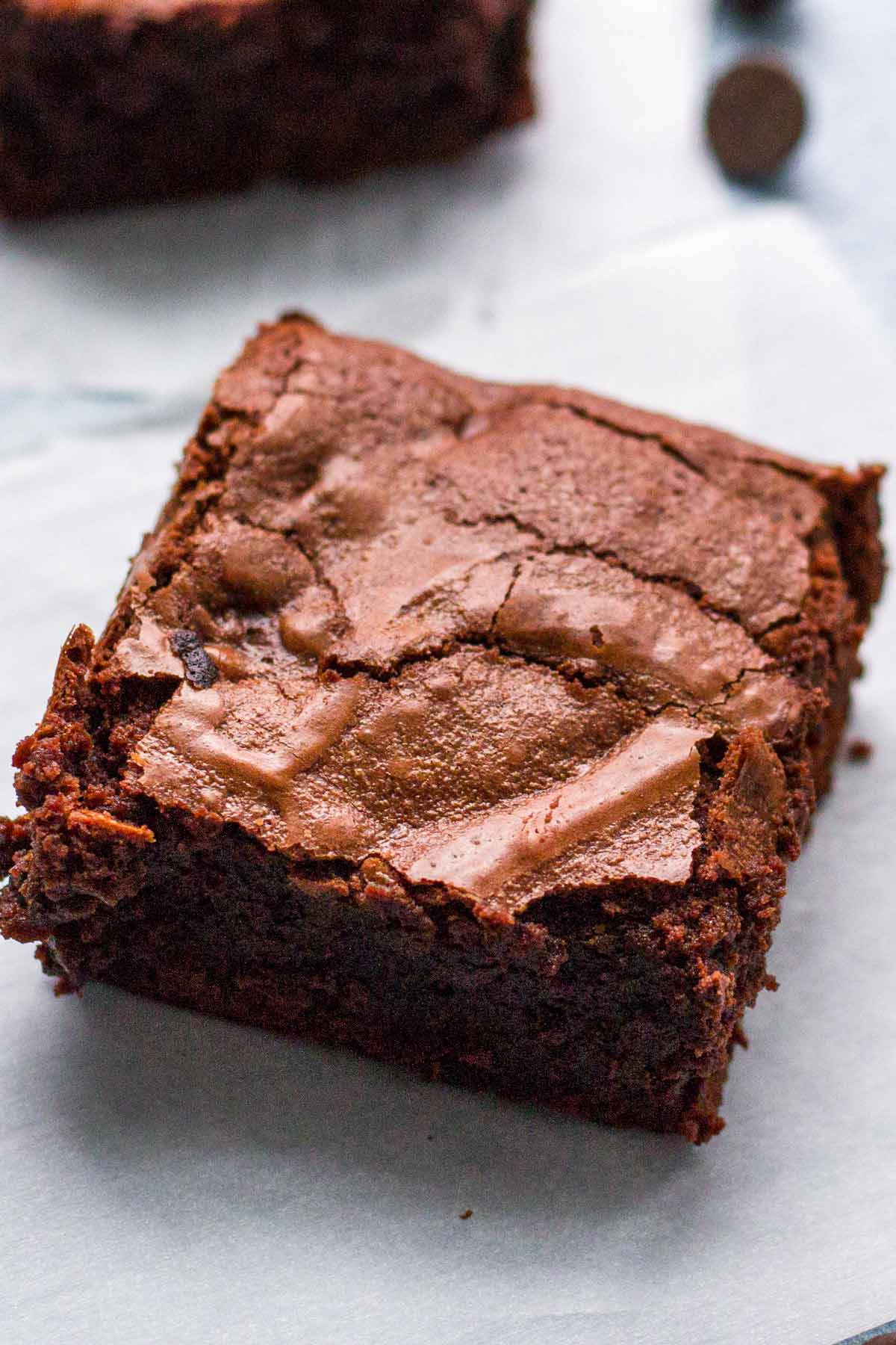 one square of cakey, chewy, and fudgy chocolate brownie