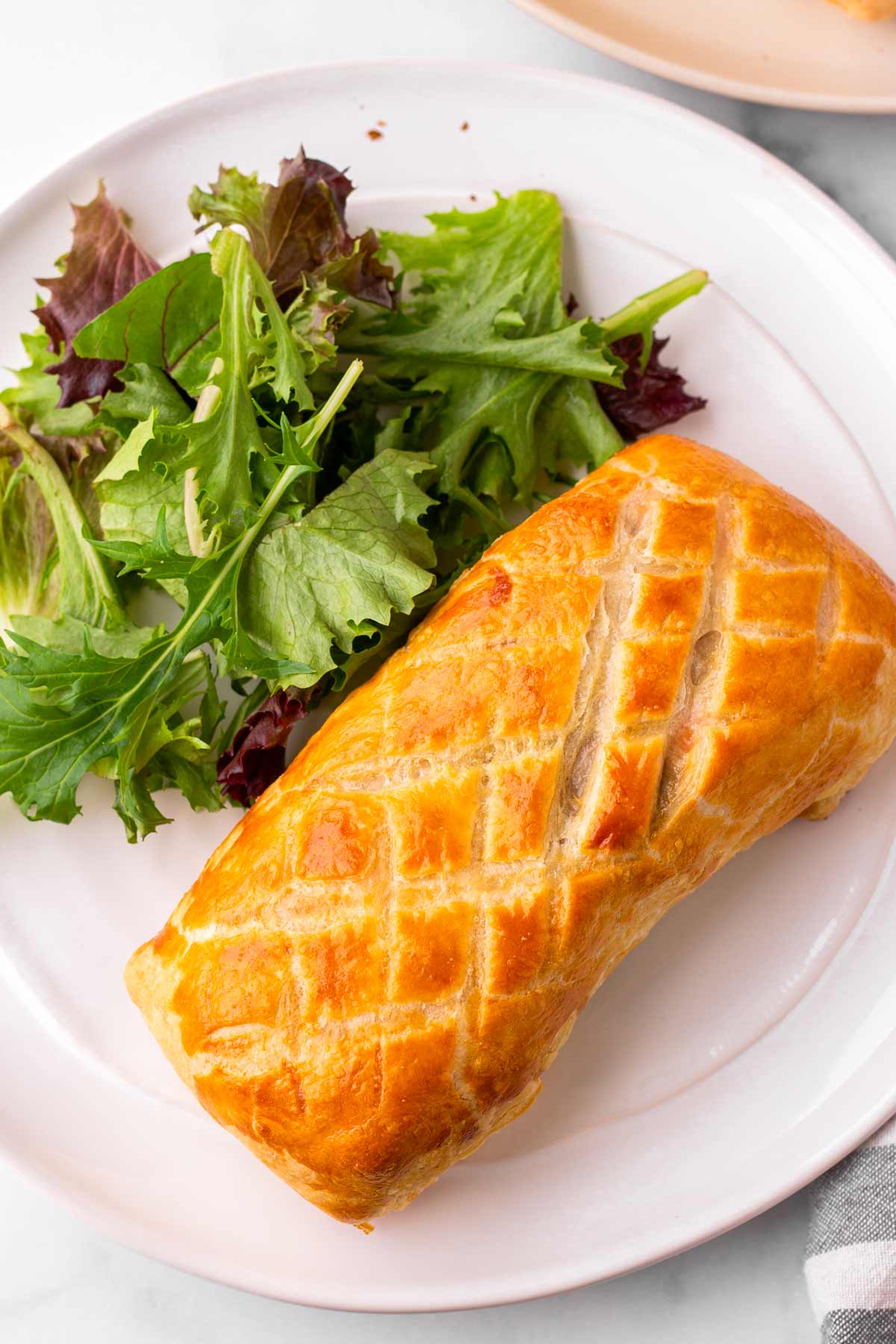 a whole baked puff pastry with salmon