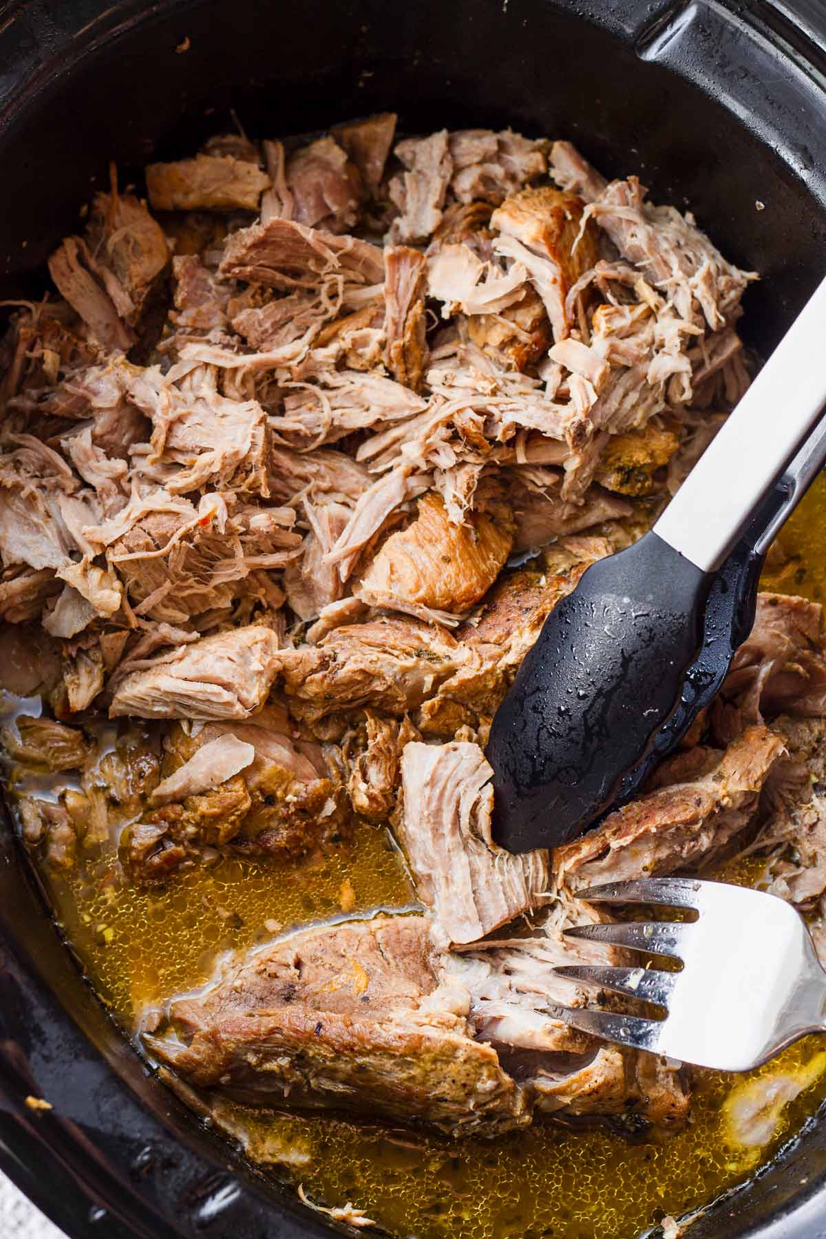 shredded cooked pork in slow cooker