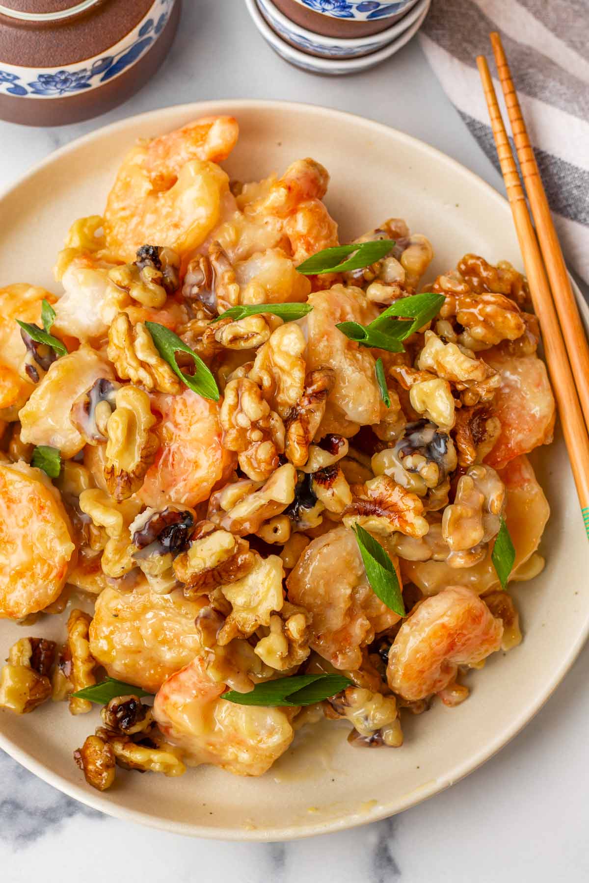 honey walnut shrimp with chopsticks