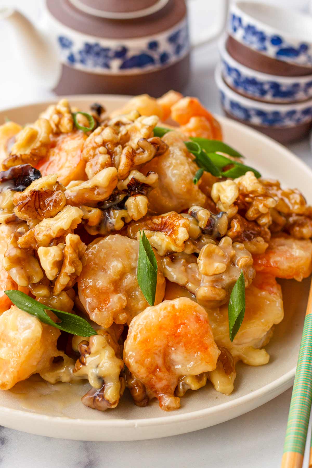 close up of honey walnut shrimp with garnish