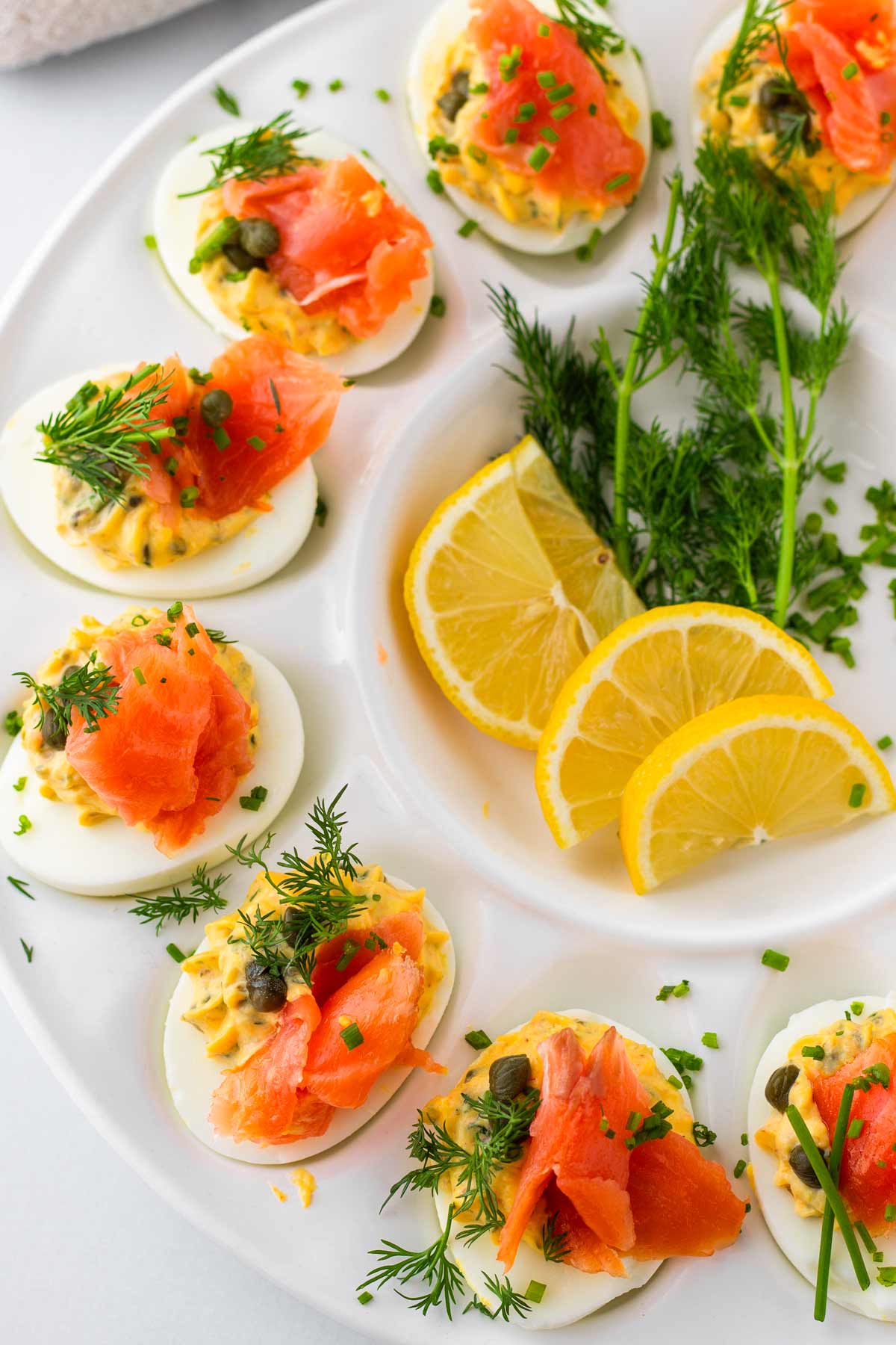 smoked salmon deviled egg platter with garnish