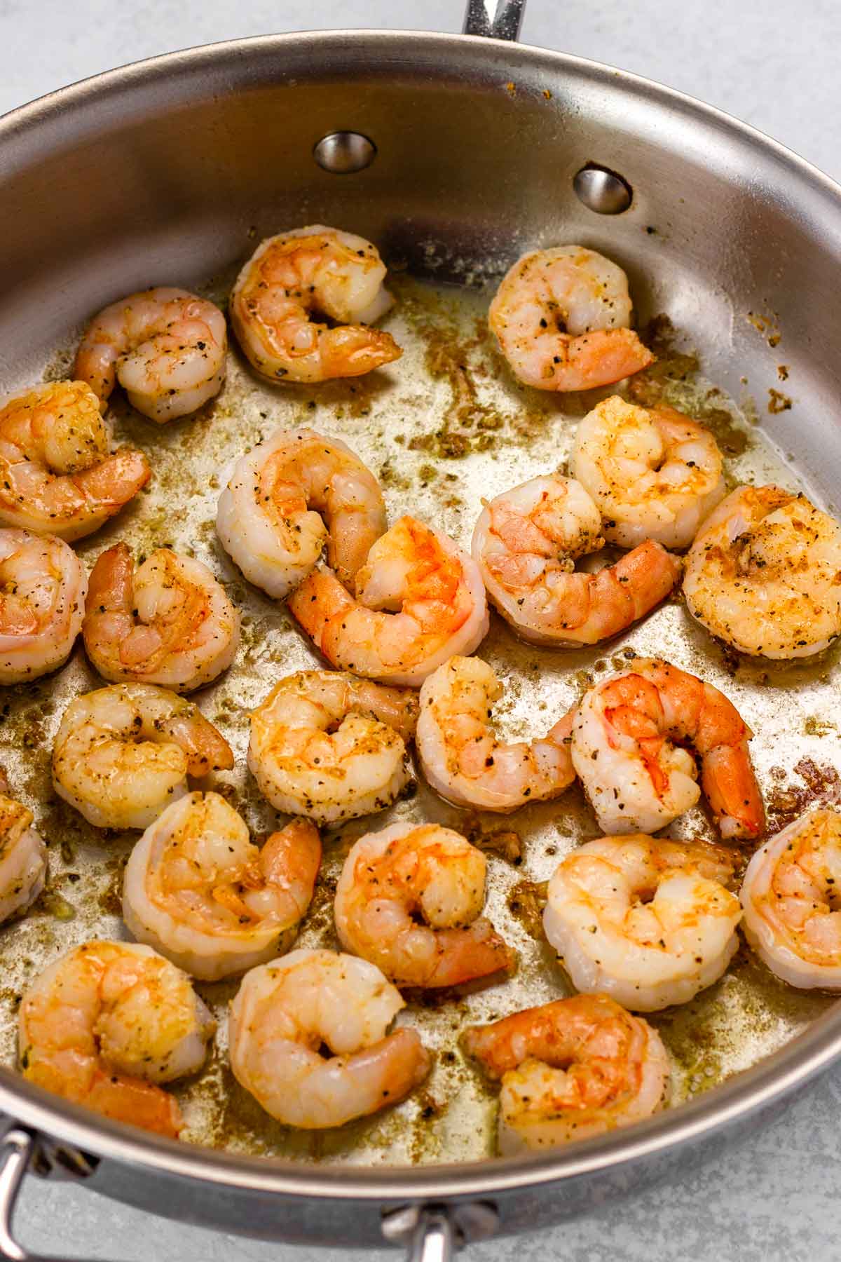 cooking shrimp in skillet
