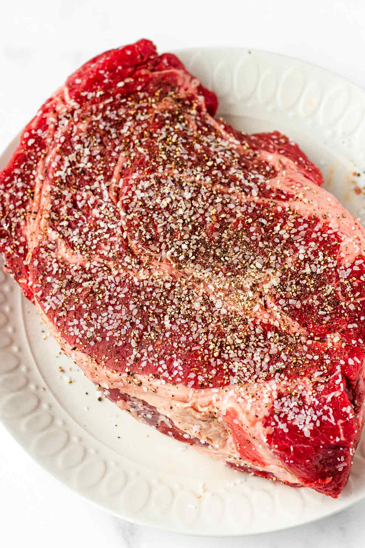 seasoned chuck roast with salt and pepper