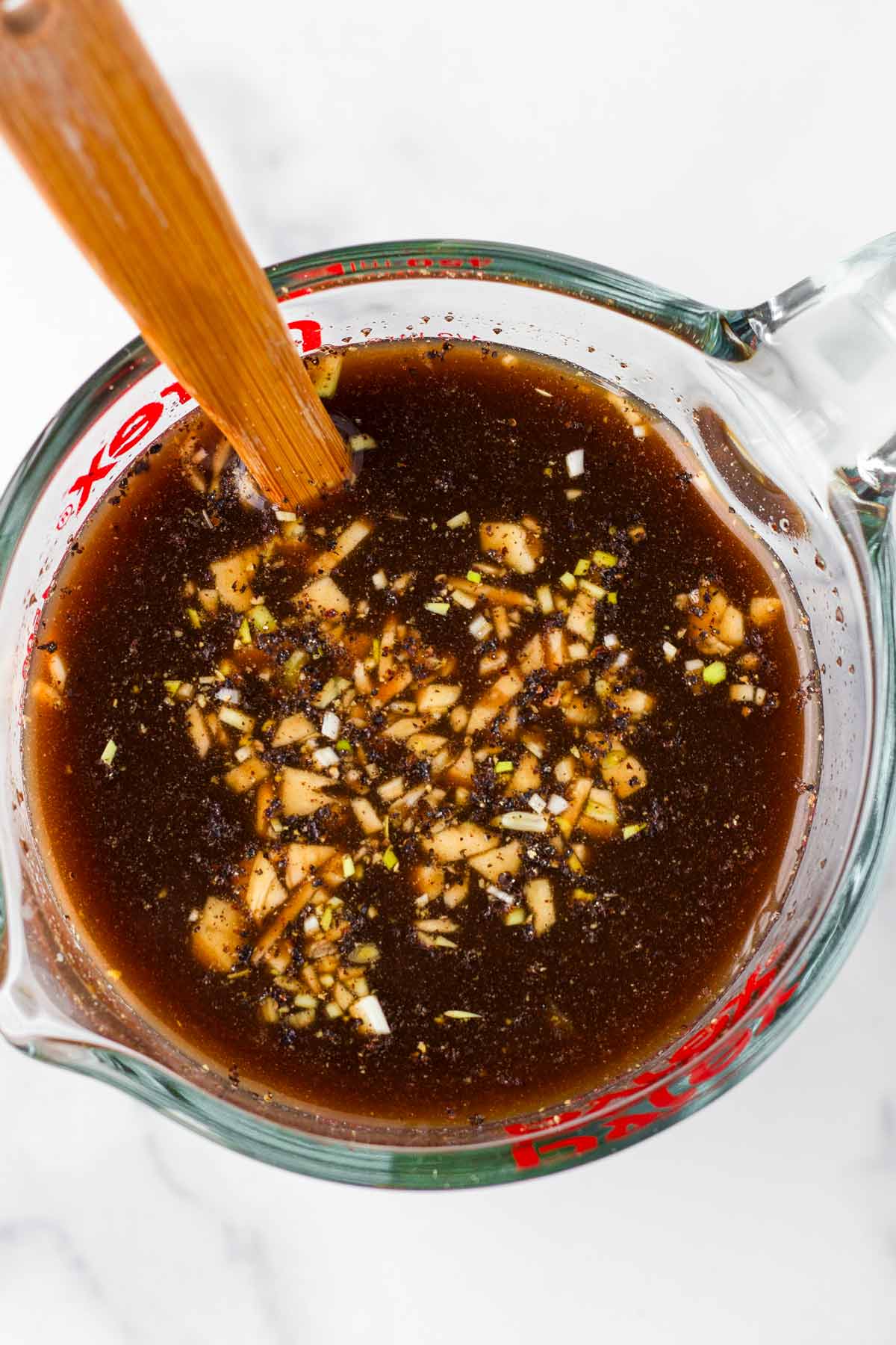 braising liquid combined in measuring cup