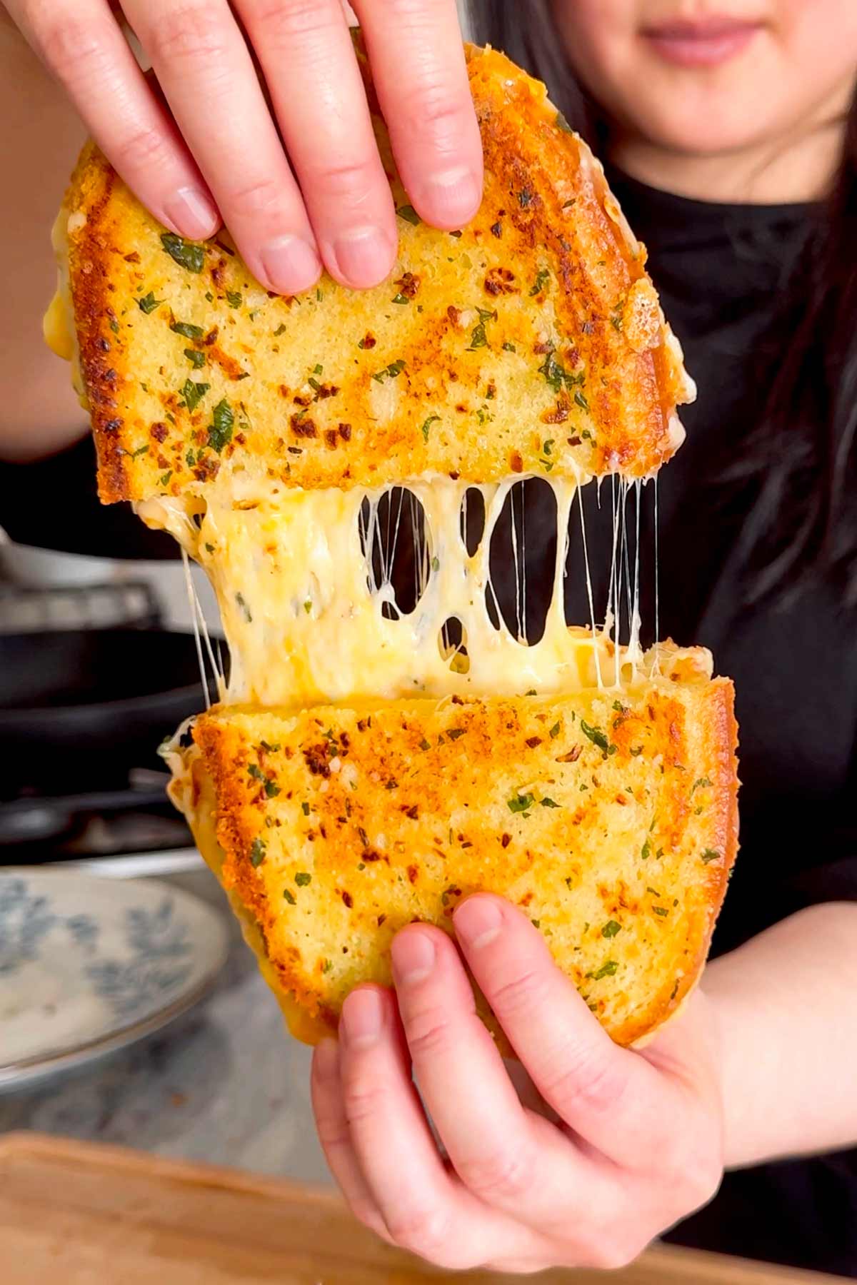 pulling cheese from bread
