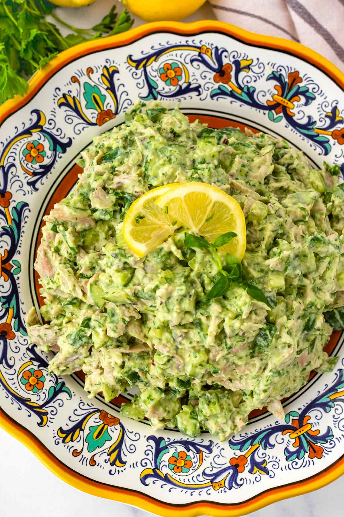 fresh green goddess salad with chicken on a plate