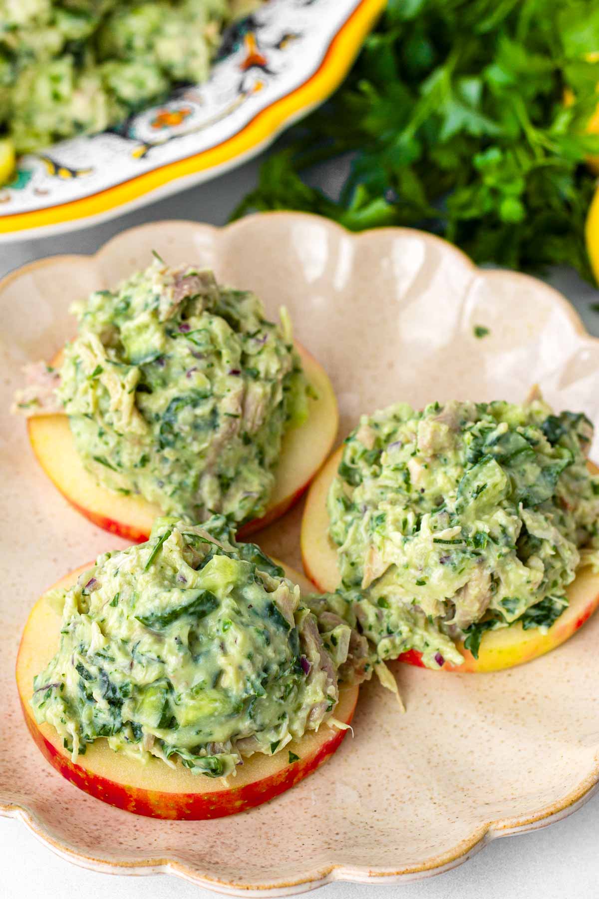green goddess chicken salad over apple slices