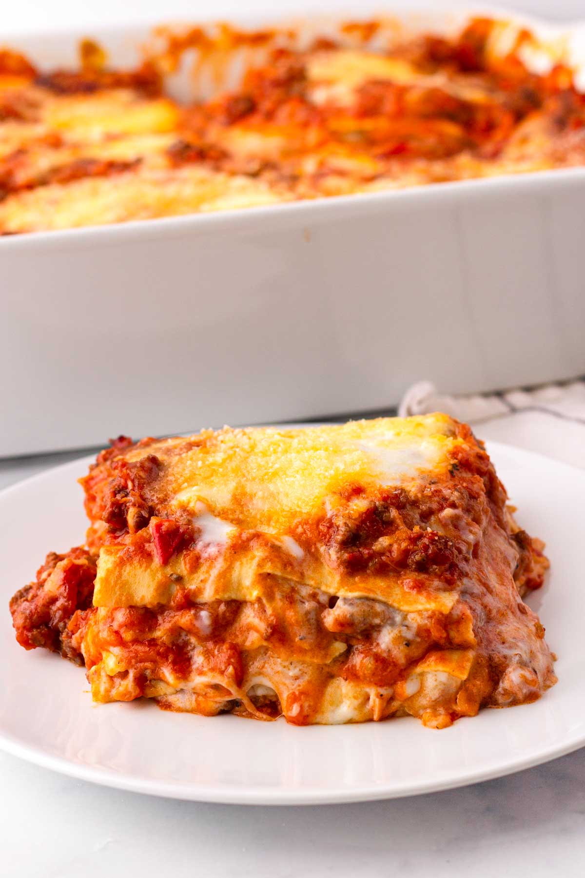 a piece of lasagna on a plate