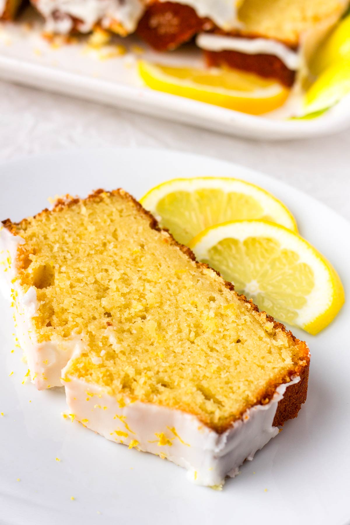 one slice of lemon bread with lemon slices