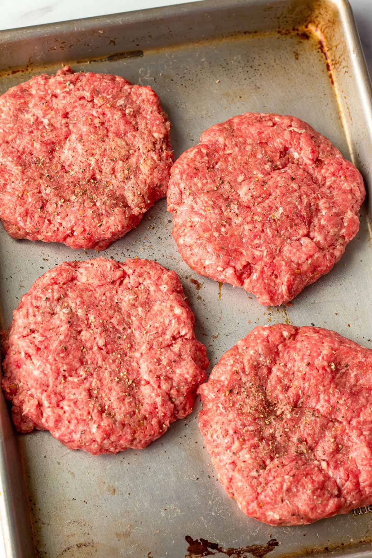 four burger patties